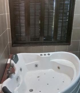 Endah Appartement | sunset studio apartment At Goldcoast morib