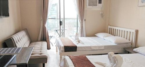 North Reclamation Area Appartement | Sunvida Tower Stays Across SM City Cebu