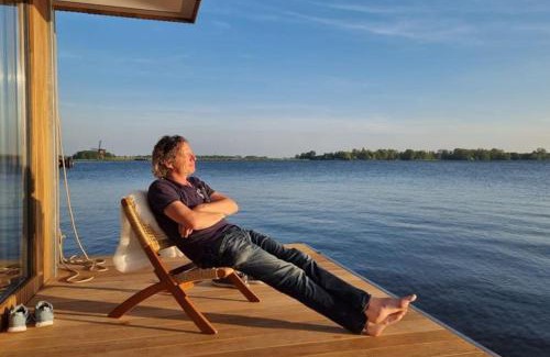 Oud Ade Location De Bateaux | Surla houseboat "Nevel" Kagerplassen with tender