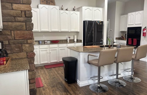 Copper Canyon Ranch Maison | Spacious 4-bedroom house in charming Surprise with resort style backyard.