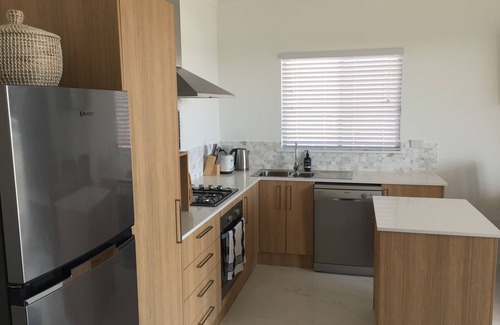 Swansea Maison | Swansea Lakeside Sunsets sont deux appartements, sur les rives du lac Macquarie