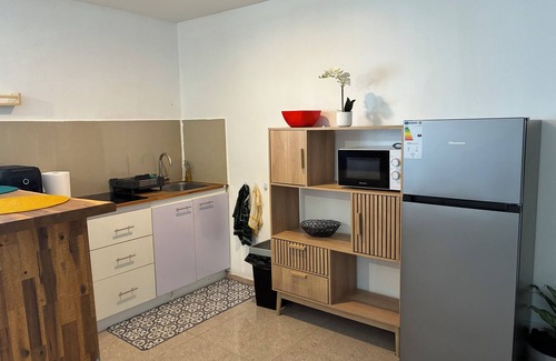 Acoua Appartement | T2 cosy Côte îlots au bord de la plage vue panoramique, coucher de soleil.