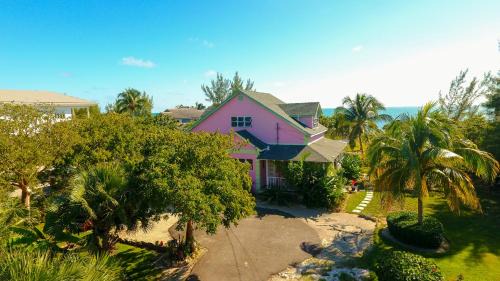 Nassau Appartement | Tangerine Sunsets Castaway by the sea