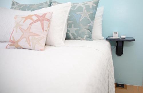 Nassau Appartement | Tangerine Sunsets Castaway by the sea