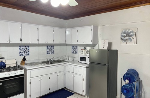 Nassau Appartement | Tangerine Sunsets Winton Rose