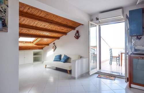 Sant'Agata di Militello Appartement | Tasteful top floor apartment with great roof terrace with beautiful sea view.