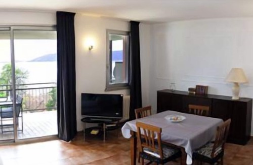 Susello Appartement | Tastefully furnished 3½-room duplex apartment with two balconies in a residence with pool