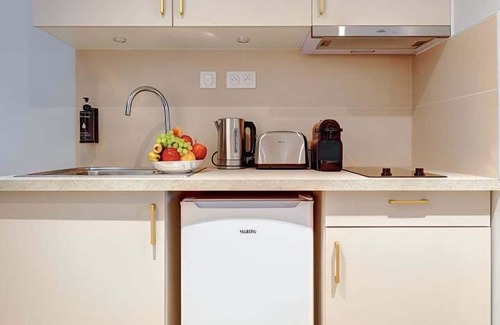 Quartier de la Porte-Saint-Denis Appartement | TBS 252- Appartement en mezzanine au cœur de Paris