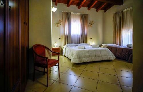 Rossano Lit Et Petit-Déjeuner | Tenuta Un Posto Al Sole Luxury B&B