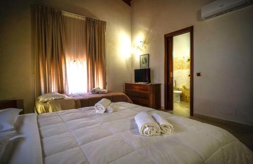 Rossano Lit Et Petit-Déjeuner | Tenuta Un Posto Al Sole Luxury B&B