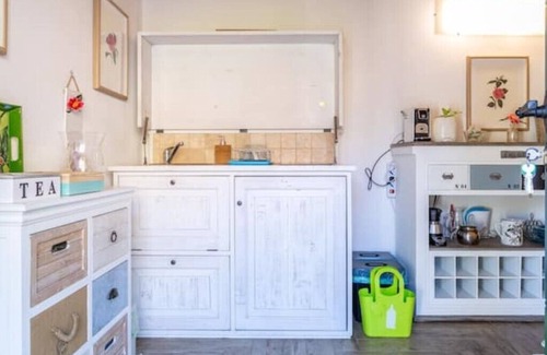 Oggebbio Appartement | Terraced studio on a botanical garden, facing lake Maggiore