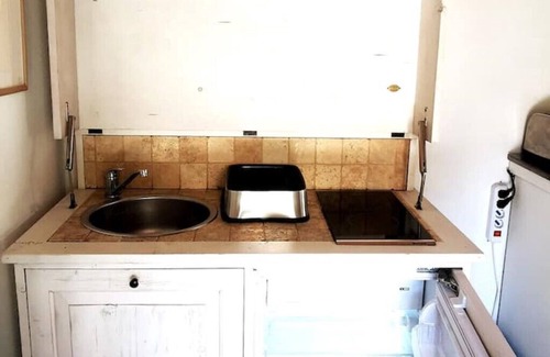 Oggebbio Appartement | Terraced studio on a botanical garden, facing lake Maggiore