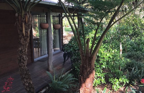 Ellalong Cabine | The Bale. Cosy cabin set amongst lush gardens in the Hunter Valley.