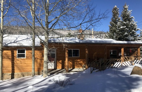 Holman Cabine | The Cabin back deck offers stunning views and only 15 minutes from Sipapu Skiing