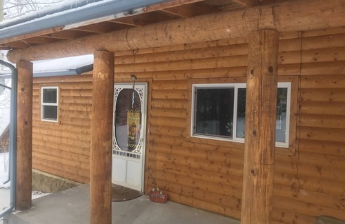 Holman Cabine | The Cabin back deck offers stunning views and only 15 minutes from Sipapu Skiing