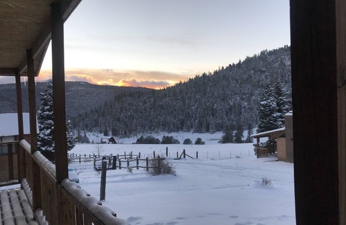 Holman Cabine | The Cabin back deck offers stunning views and only 15 minutes from Sipapu Skiing