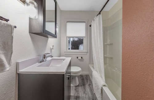 Saint James Maison | The Christine - 3 bed, 2 bath house has wifi, a work space, and 3 season porch.