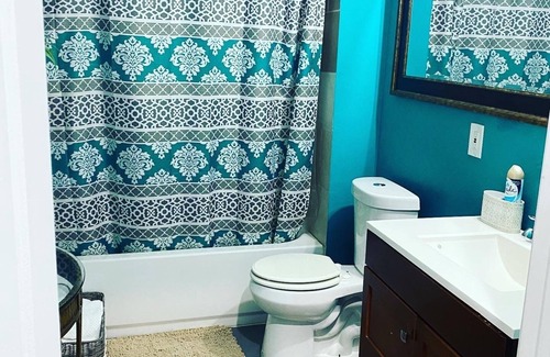 Powder Springs Maison | The Classy Cave! A spacious, basement suite hideaway w/ hotel style kitchenette.