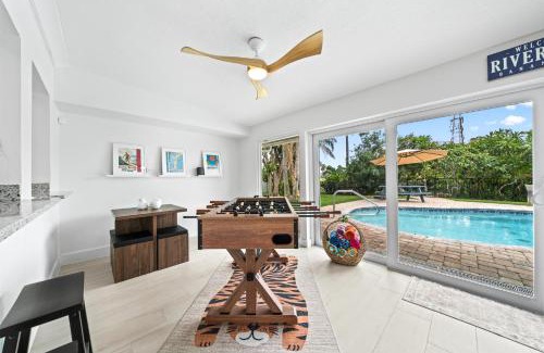 Venetian Way Maison | The Cocoa Plum - A Quiet Riverfront Pool Home Near Beach
