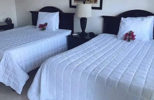 Nassau Hôtel | The Colony Club Inn & Suites