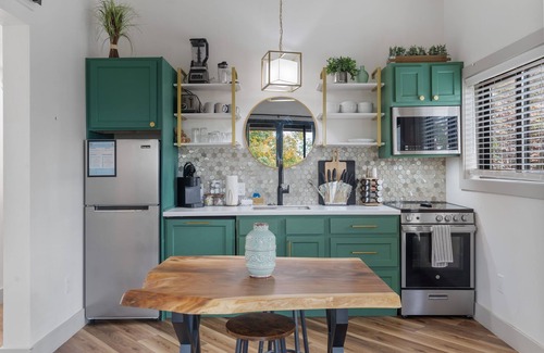 Wildwood Maison | The Evergreen Treehouse with Winter Views!