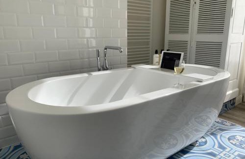 Stationsbuurt Noord Lit Et Petit-Déjeuner | The Hamptons Boutique Hotel