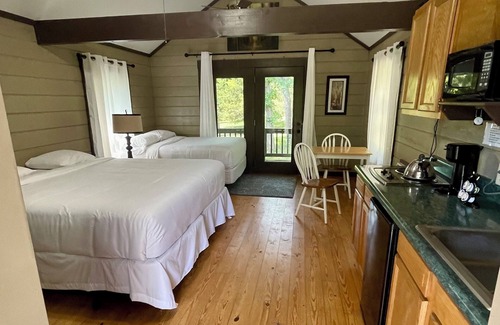 Gallatin Cabine | The hideaway retreat cabin has views of open fields and sweet water lake.