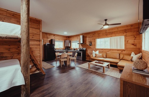 South Bloomingville Cabine | The Hideout - Escape to The Hideout in Hocking Hills, OH! This cozy, pet-friendly cabin offers a private deck by Pine Creek, just minutes from hiking, waterfalls, and caves. Perfect for up to 4 guests. Book your nature-filled getaway today!