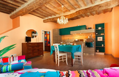 San Gimignano City Centre Appartement | La maison est située au coeur de la Toscane, dans le centre historique de San Gimignano.