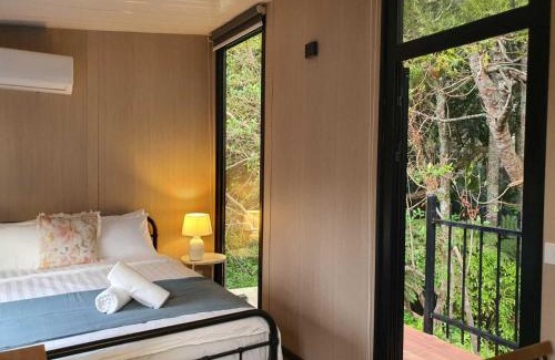 Waitoki Maison | The Kauri Retreat by Tiny Away
