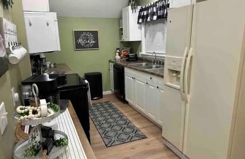 East Moline Maison | The Landing Zone. Comfortable and cozy three bedroom with two car garage.