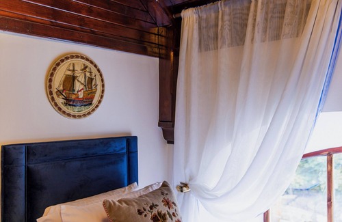 Halistra Maison | The Old Church. Three bedroom property with sea views and luxurious interiors.