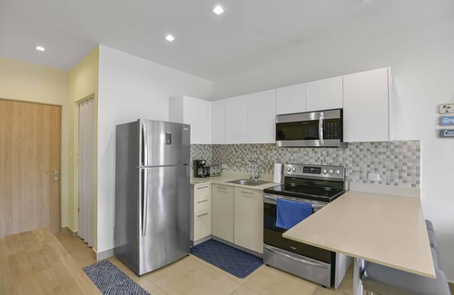 Bejuco Copropriété | The Palms, Beachfront Condo with AC and pools!