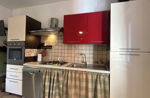 Orta San Giulio Appartement | The Pink House of Riso Amaro In the painted village Legro of Orta San Giulio