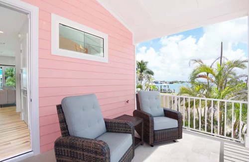 Fort Myers Beach Maison | The Pink Pearl: Chic beach house with Gulf access & sunset views—ideal Fort Myers Beach escape!