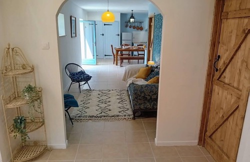 Plomodiern Maison | The Red Squirrel - stable cottage with shared heated pool 10 mins from beach