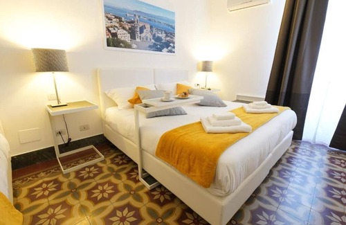 Messina Maison | Les chambres de la Piazza Cairoli, chambre triple de luxe