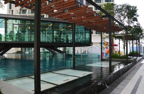 Bunga Paya Pantai Appartement | The Shore Residence Apartment