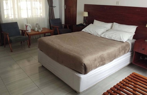 Nyanga Hôtel | The Village Inn Hotel