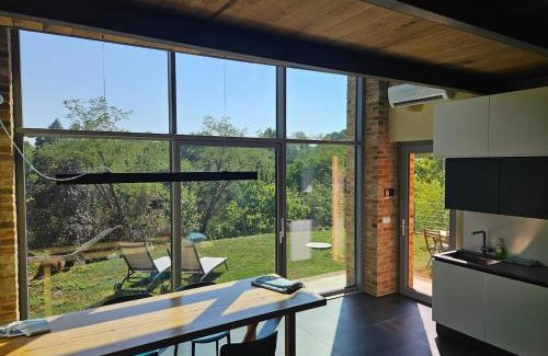 Capriglio Maison | The Window on the Forest View