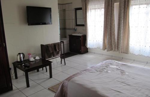 Sabie Lit Et Petit-Déjeuner | The Woodsman Bed and Breakfast