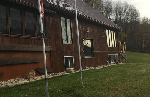 Richland Center Maison | This 3 story home is set on a hillside & includes all imaginable amenities.