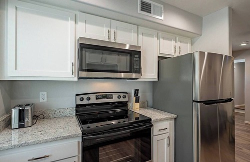 Amphi Appartement | This centrally located 1 bedroom 2 bathroom is fully remodeled with electric vehicle charging on site