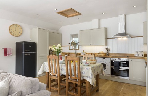 Kingham Cottage | Grooms Cottage est dans le paisible village des Cotswolds de Kingham.