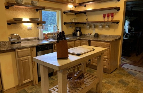 Ashford Cabine | This historic cabin is just a few miles from Mt Rainier National Park. Pet friendly. Fish pond, pastures, old cedars, 11-acres. Private hot tub surrounded by grove of old cedars.