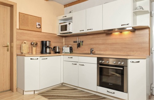 Kaltenhof Maison | This semi-detached holiday home is located on a plot of over 600m², fenced in wi