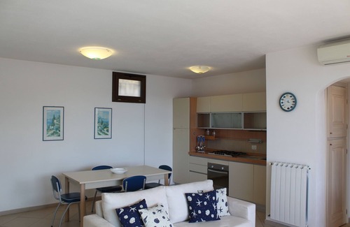 La Maddalena Appartement | appartement de trois pièces dans un environnement calme avec terrasse vue sur la mer