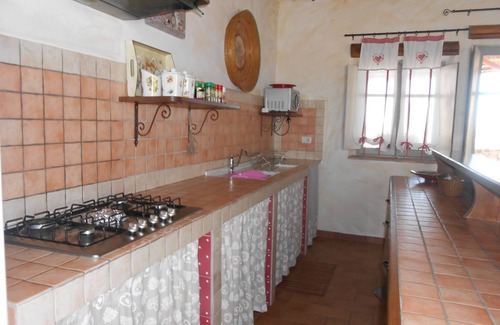San Giovanni Suergiu Maison | Appartement de trois pièces avec jardin 4 lits Mer et Relax WIFI Parking aire de jeux