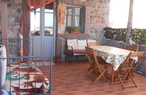 San Giovanni Suergiu Maison | Appartement de trois pièces avec jardin 4 lits Mer et Relax WIFI Parking aire de jeux