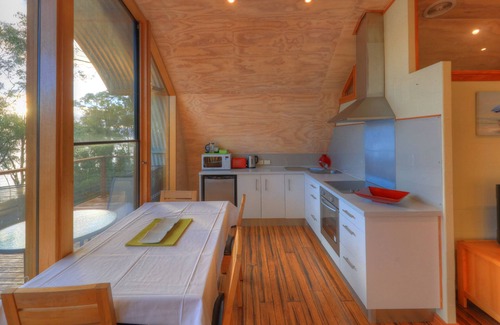 Killora Maison | Trois arbres retirent une vue imprenable